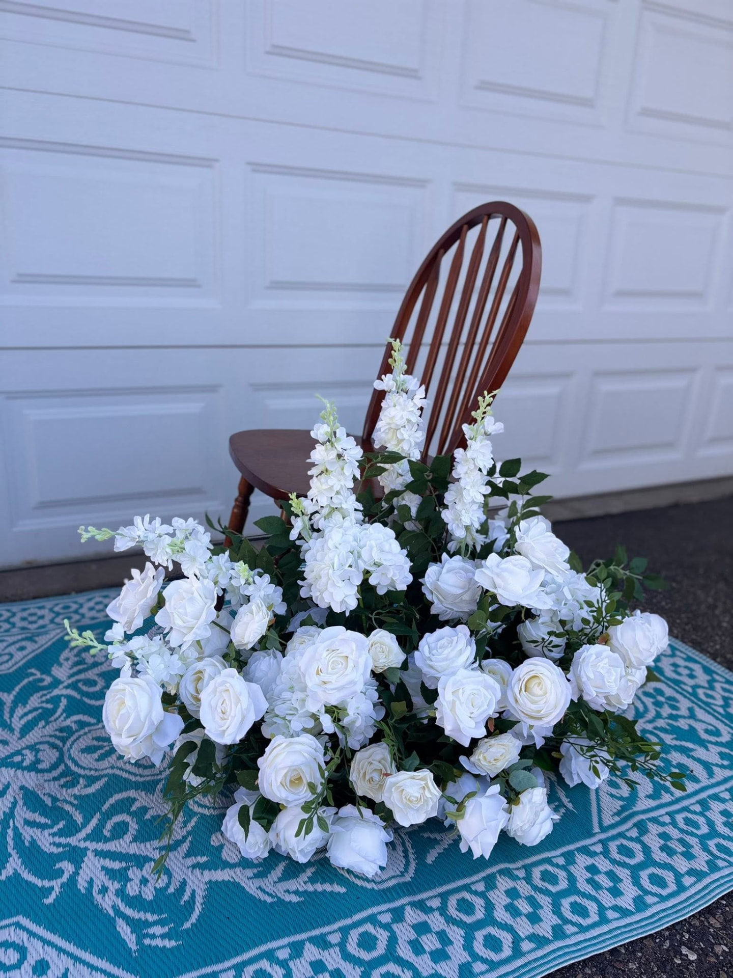 Large white faux floral arrangement for an event