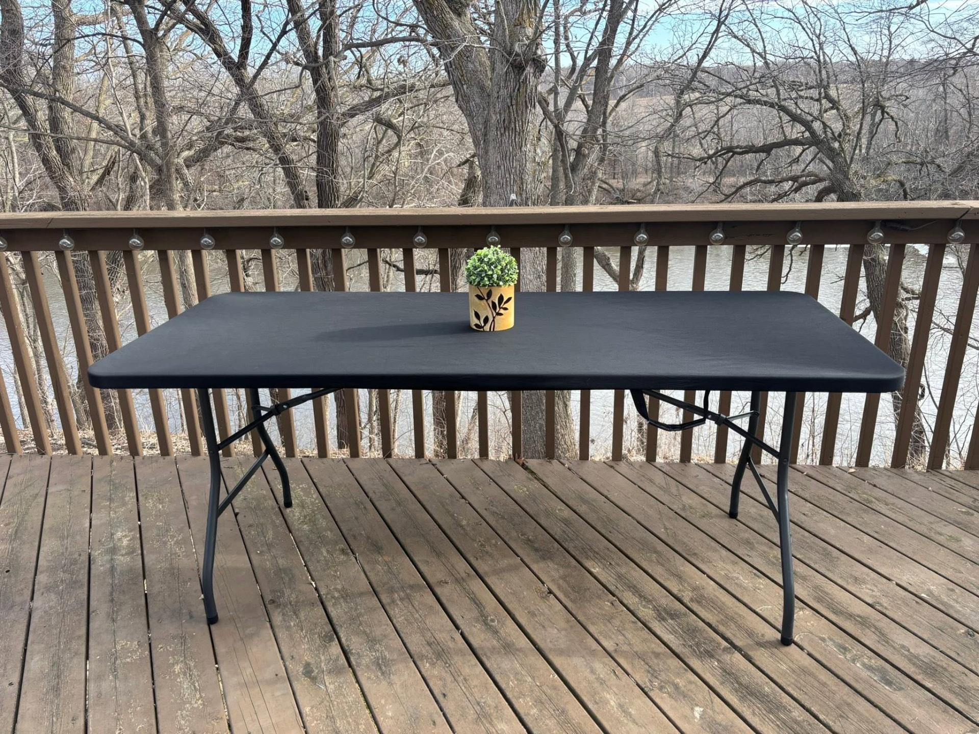 Black table cover displayed outdoors