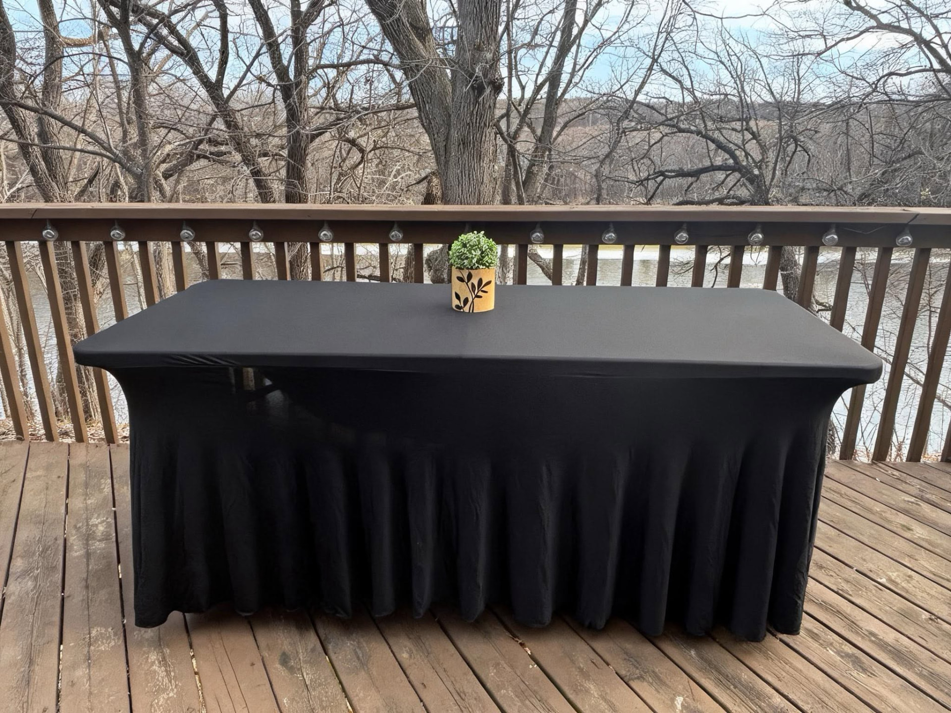 Black draped table linen for a formal celebration